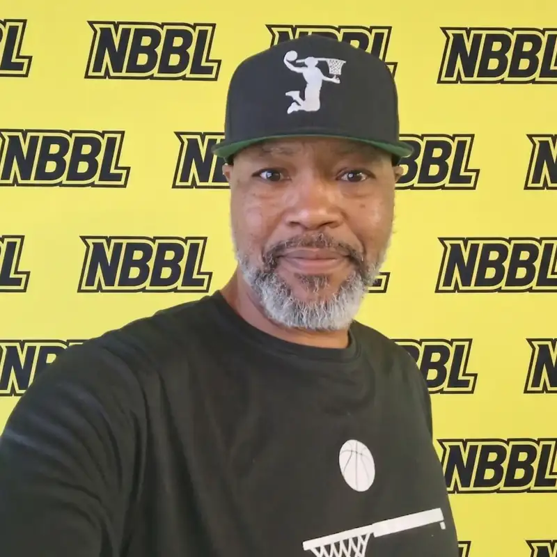Founder Mark Tee Armstrong in front of an NBBL backdrop